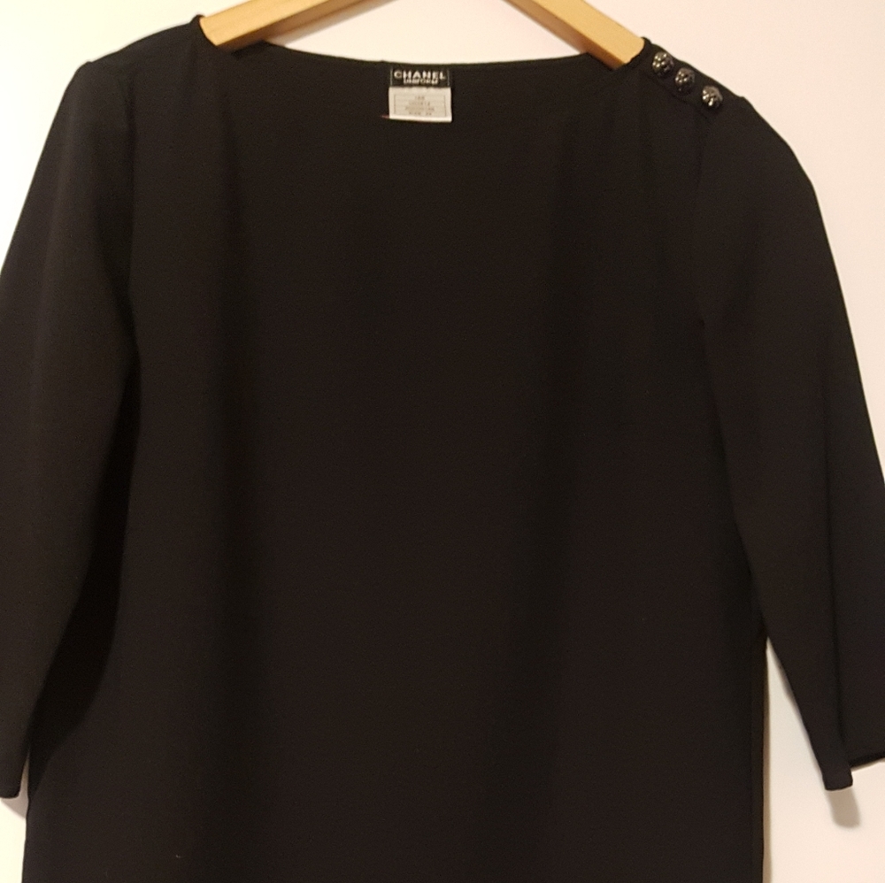 Chanel Black  top with Camellia Buttons.